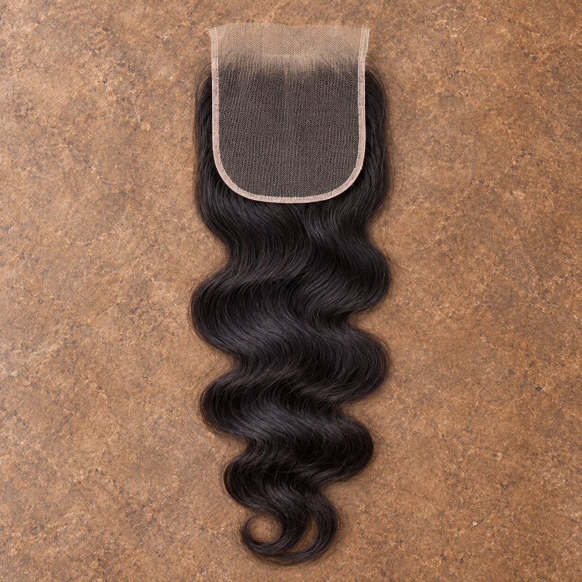 Multi-donor Body Wave lace closure on brown stone