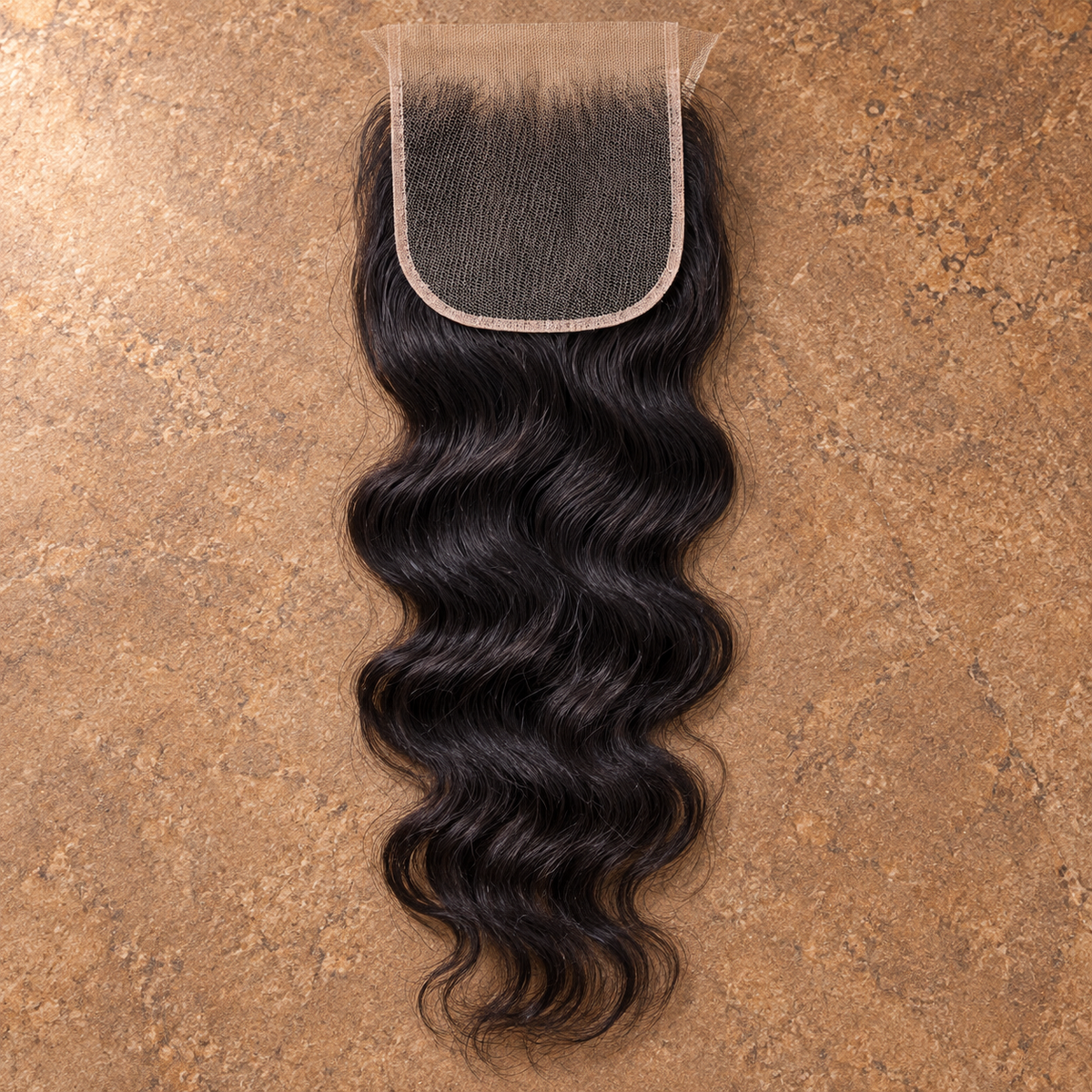 Multi-donor Indian Wave lace closure on brown stone