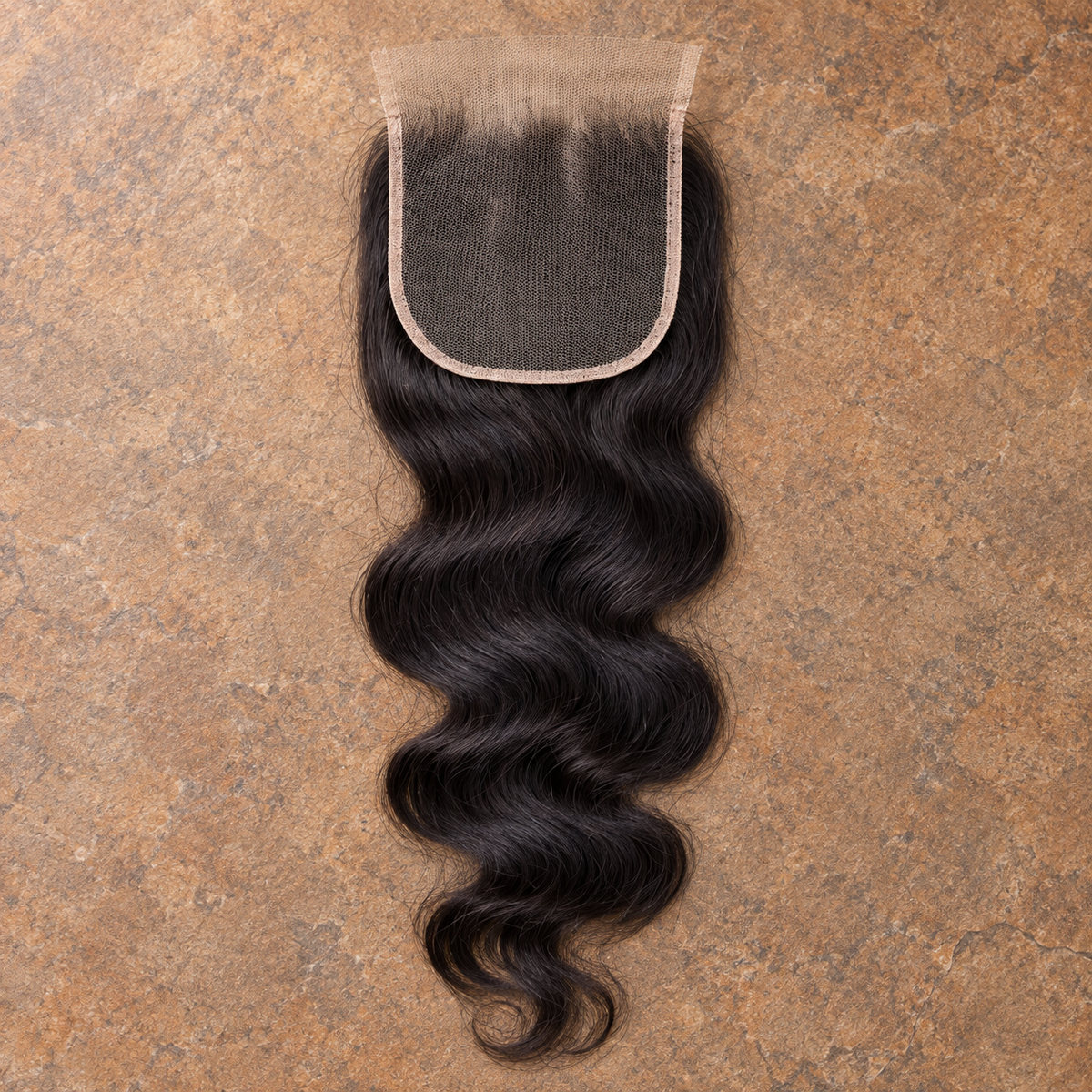 Multi-donor Loose Wave lace closure on brown stone